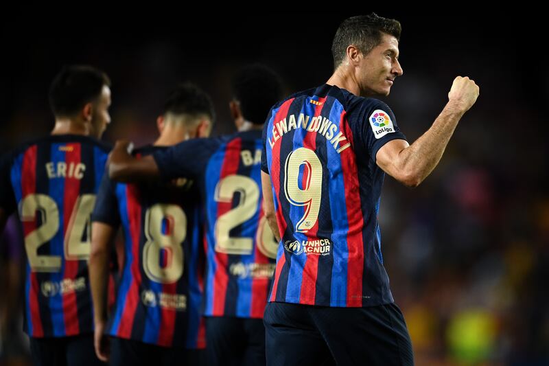 Robert Lewandowski celebrates after scoring Barcelona's third goal. Getty