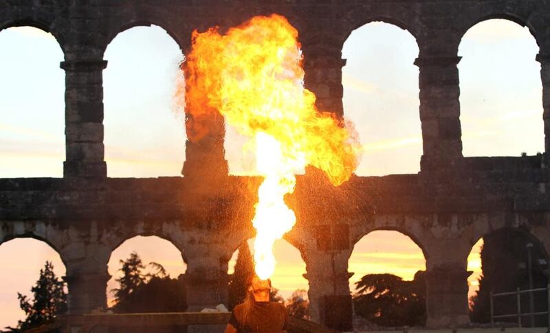 A firebreather performs at the Roman amphitheatre in Pula, Croatia. Antonio Bronic / Reuters