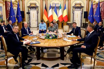 Left to right: Italian Prime Minister Mario Draghi, German Chancellor Olaf Scholz, Ukrainian President Volodymyr Zelenskyy, French President Emmanuel Macron and Romanian President Klaus Iohannis meet for a working session in Mariinsky Palace, in Kyiv. EPA