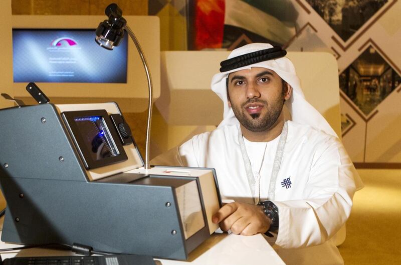 Emirati inventor Amer Al Jabri won a silver medal at the Seoul International Invention Fair for his cost-effective E7 passport reading machine. Christopher Pike / The National