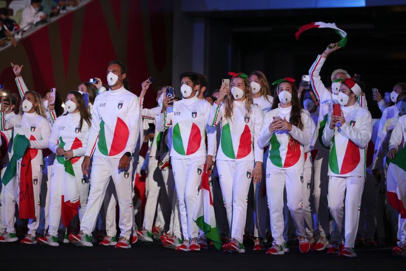 Team Italy arrives during the opening ceremony in the Olympic Stadium at the 2020 Summer Olympics in Tokyo, Japan. Pool Photo via AP