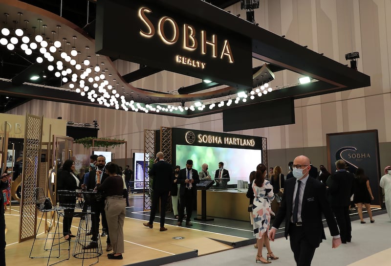 Visitors at the Sobha Realty stand on the first day of Cityscape Global held at the Dubai Exhibition Centre. The company has a target of $1bn in total sales this year. Pawan Singh/The National