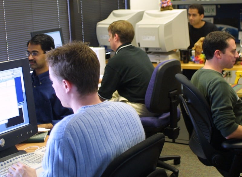 Employees working in the office, dubbed the 'Googleplex', in 2003. Getty Images