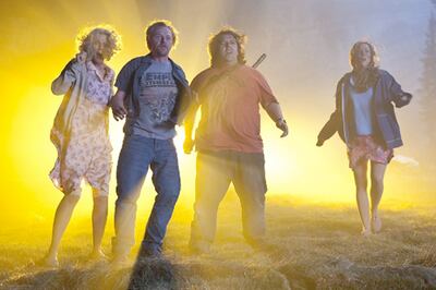 L to R: Blythe Danner as Tara Walton, Simon Pegg as Graeme Willy, Nick Frost as Clive Gollings and Kristen Wiig as Ruth Buggs in Paul.
