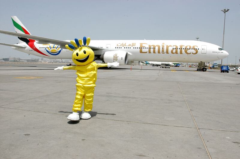 Dubai Summer Surprises mascot Modhesh poses alongside an Emirates plane in 2005. Photo: DFRE