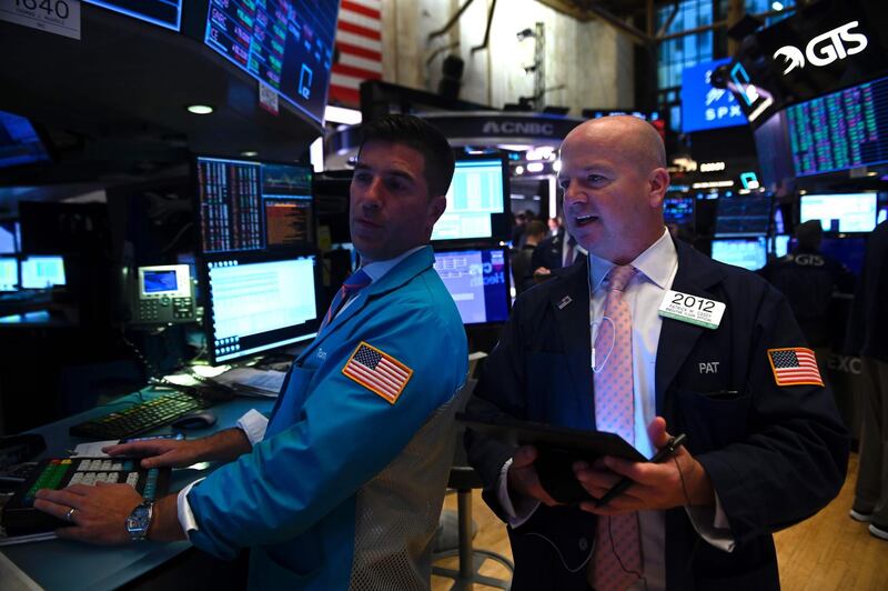 Traders work before the closing bell at the New York Stock Exchange (NYSE) on September 27, 2019 at Wall Street in New York City. / AFP / Johannes EISELE
