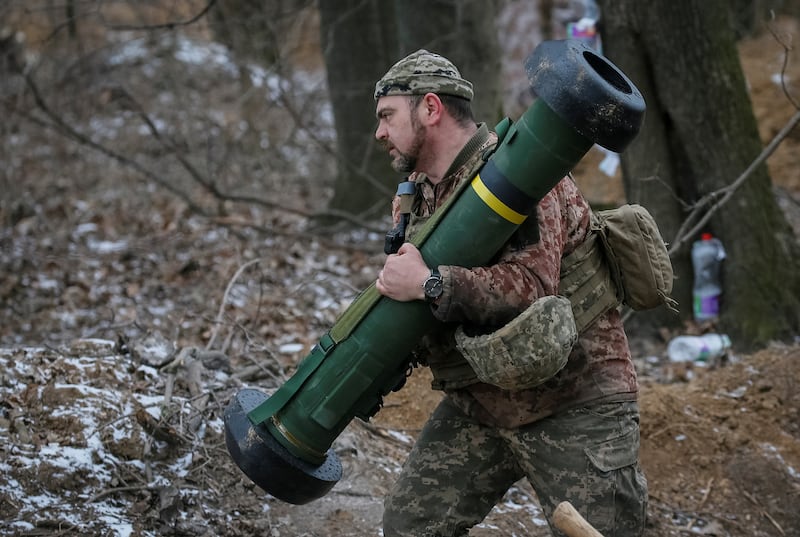 A Ukrainian serviceman with a Javelin missile system on the front line near Kyiv. Reuters