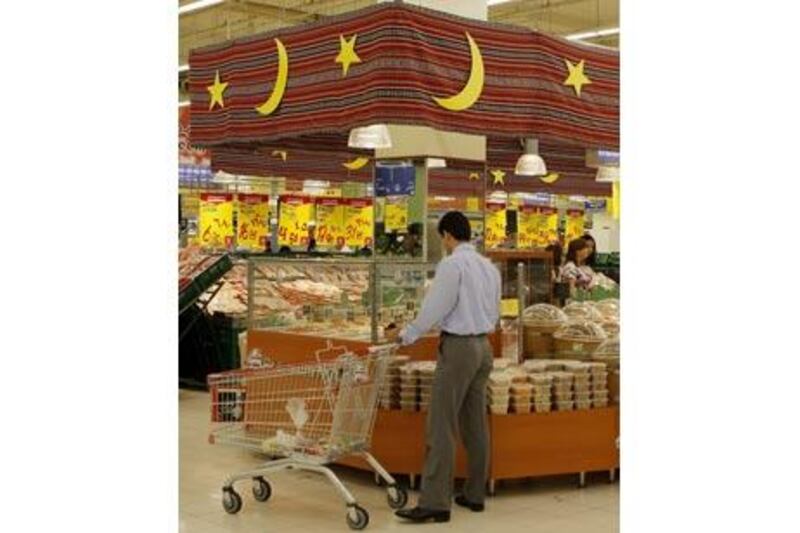 Moons and stars on traditional style fabric for Ramadan seen in Carrefour supermarket in Marina Mall.