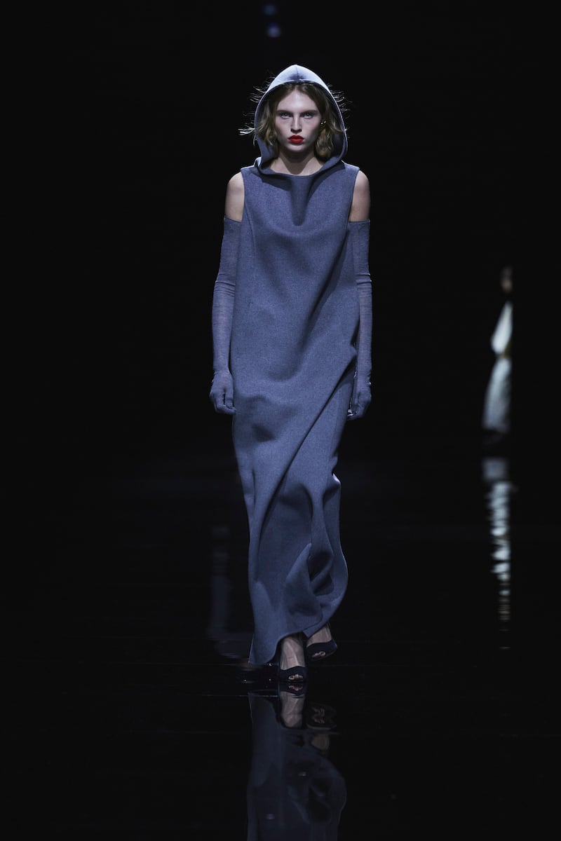 Khaite played with volume, such as this draped dress with a hood. Photo: Khaite