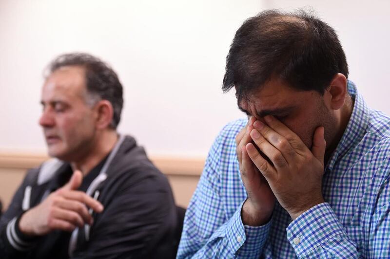 Akhtar Iqbal, husband of Sugra Dawood, left, , and Mohammad Shoaib, husband of Khadija Dawood, at a Bradford news conference to appeal for the return of their wives and children who are suspected of having travelled to Syria to join extremists there. Paul Ellis/AFP Photo