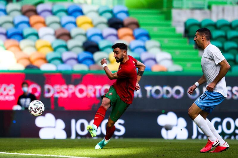 Portugal's Bruno Fernandes scores the opening goal. EPA