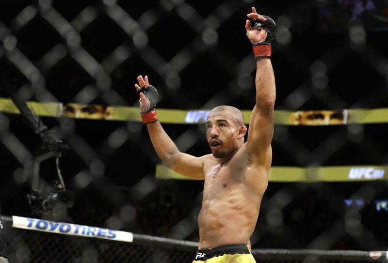 Jose Aldo celebrates after defeating Frankie Edgar during their featherweight championship bout at UFC 200, Saturday, July 9, 2016, in Las Vegas. John Locher / AP Photo