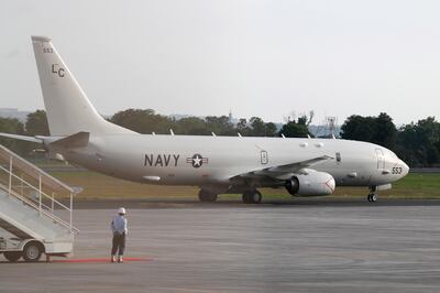 epa09158085 US Navy's Boeing P-8 Poseidon lands after taking part in the search operation for the missing Indonesian Navy submarine KRI Nanggala, at a command in Ngurah Rai Airport in Bali, Indonesia, 25 April 2021. Indonesian military confirmed that the German-made submarine that was reported missing on 21 April 2021 near the island of Bali has sunk with 53 people on board.  EPA/MADE NAGI