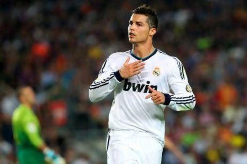 Real Madrid's Cristiano Ronaldo celebrates after scoring against Barcelona.