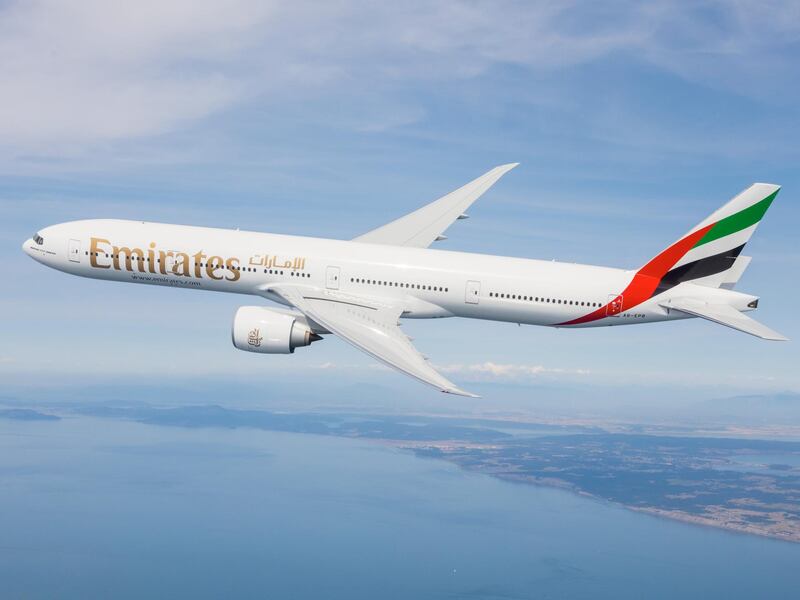 Emirates Boeing 777-300ER photographed on August 17, 2015 from Wolfe Air Aviation's Lear 25B.