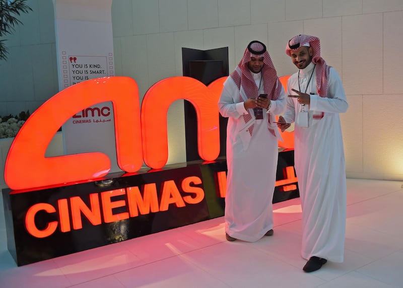 Saudi men poses for a photograph at an invitation-only screening of Black Panther at the King Abdullah Financial District Theatre, in Riyadh. Fayez Nureldine / AFP Photo