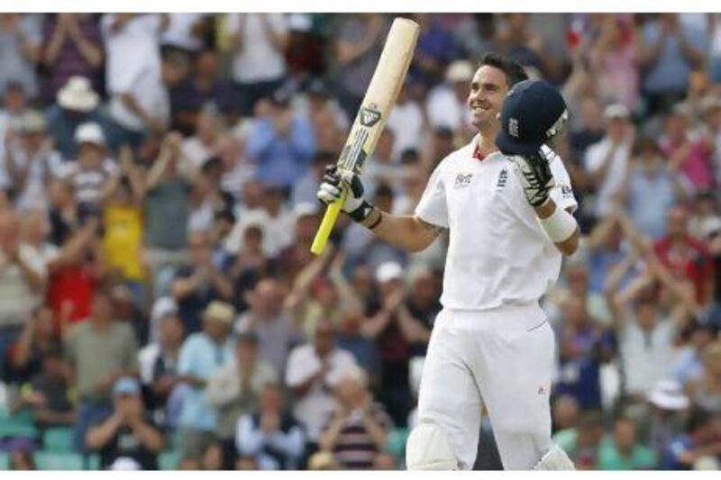 Kevin Pietersen celebrates reaching his hundred yesterday as he and Ian Bell put England in a strong position.