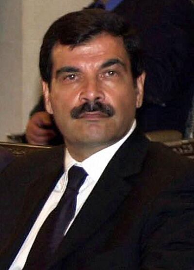 (FILES) This file picture shows the brother-in-law of Syrian President Bashar al-Assad General Assef Shawkat siting during condolences at the Damascus People's Palace, 13 June 2000.  Syrian President Bashar al-Assad has named 18 February 2005 his brother-in-law General Assef Shawkat as the country's new military intelligence chief, an official today.  EDS NOTE: BEST QUALITY AVAILABLE    AFP PHOTO/FILE (Photo by AFP)
