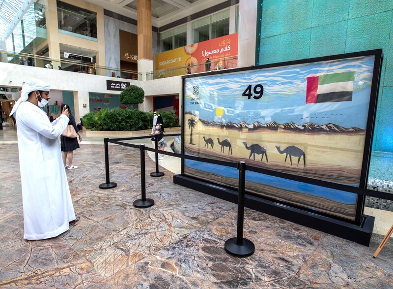 Abu Dhabi, United Arab Emirates, December 3, 2020.   A Guinness World Records certificate was given to Yas Mall for the largest "Sand Art Structure", yesterday, 2 December 2020.  Visitors may see this at the Town Square area, Yas Mall.
Victor Besa/The National
Section:  NA