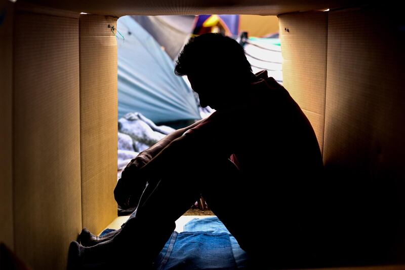 A member of the Central American migrant caravan rests at a shelter in the city of Tijuana, Baja California, Mexico. EPA