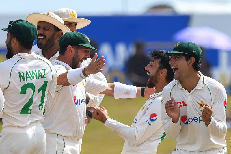 Agha Salman, second right, with teammates after taking the wicket of Sri Lanka's Angelo Mathews. AFP