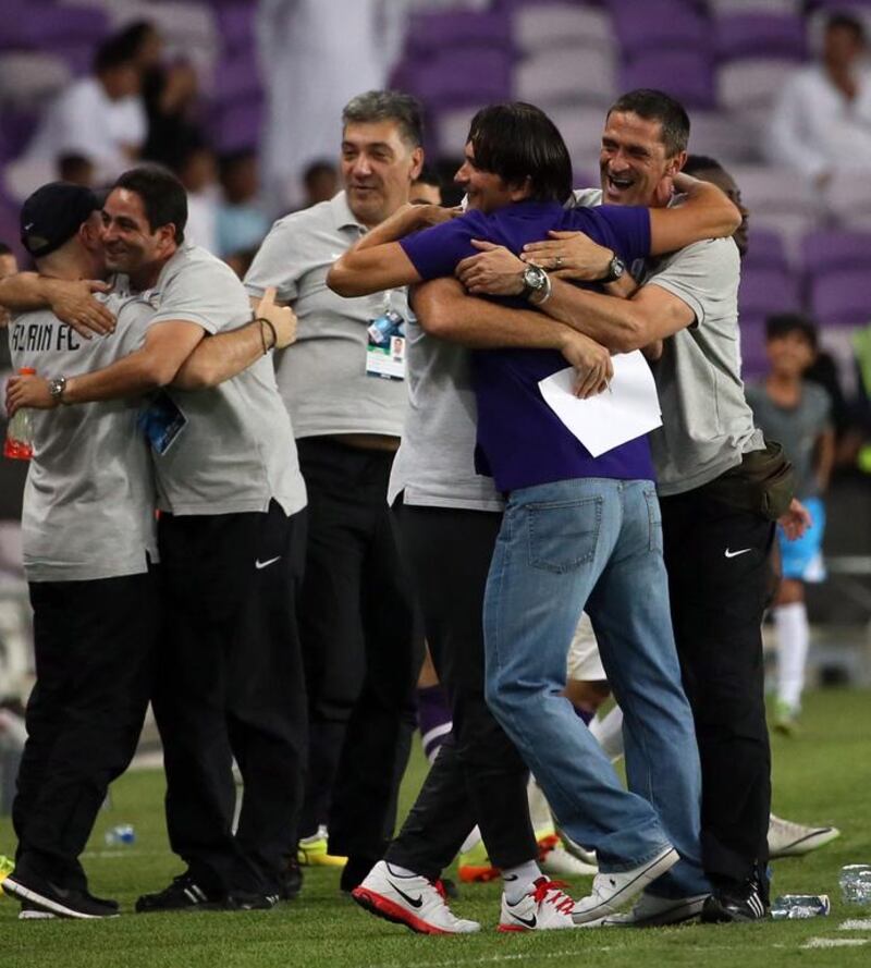 Al Ain manager Zlatko Dalic congratulates after advancing to the Asian Champions League quarter-finals with a win over Al Jazira. Karim Sahib / AFP / May 13, 2014