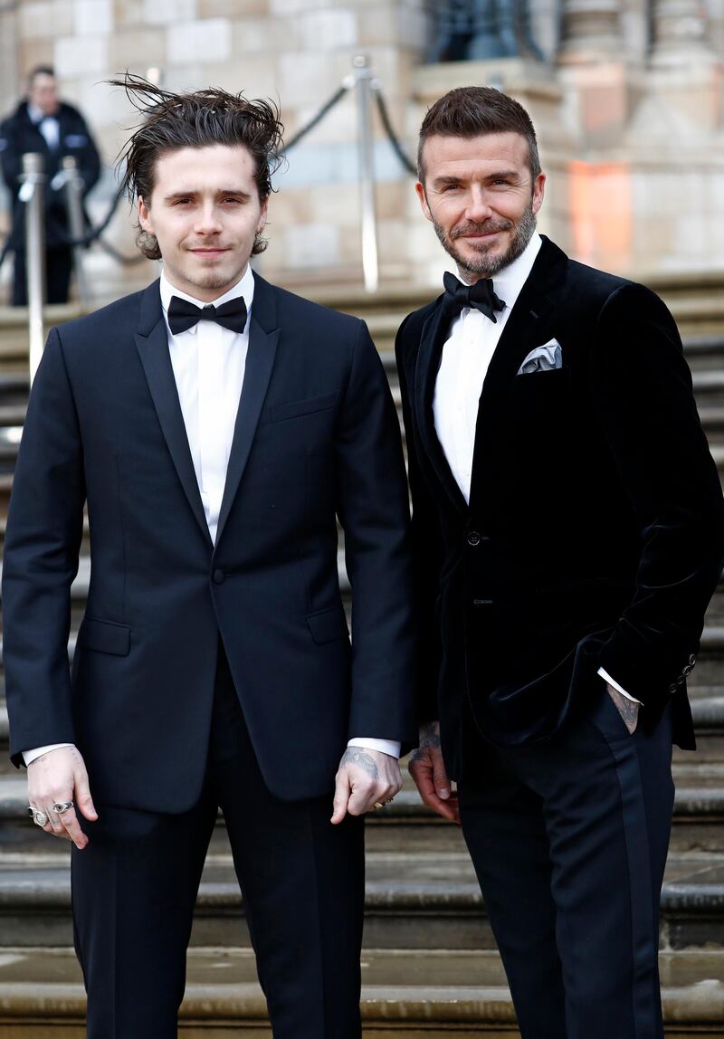 LONDON, ENGLAND - APRIL 04: Brooklyn Beckham and David Beckham attend the "Our Planet" global premiere  at Natural History Museum on April 04, 2019 in London, England. (Photo by John Phillips/Getty Images)