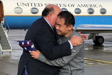 US ambassador to Switzerland Edward McMullen welcomes Xiyue Wang following his release from Iran after a prisoner swap. AFP/US State Department