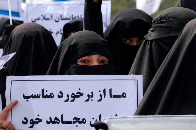 Women march to show support for the Taliban in a rally outside the Shaheed Rabbani Education University in Kabul. EPA