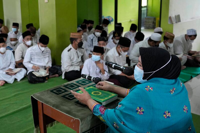 Maria Ulfah teaches Quran recitation at Baitul Qurro Islamic Boarding School in Jakarta, Indonesia. All photos: AP