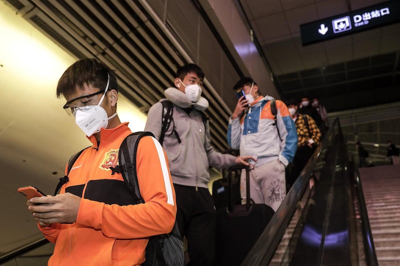 Players of the Wuhan Zall football team arrive at Wuhan railway station in Hubei, China. The  team left Wuhan on January 5, 2020 for a training session in Guangzhou of Guangdong Province. Since then they have spent 104 days training in Malaga, Spain and other cities in Guangdong before finally returning. Getty