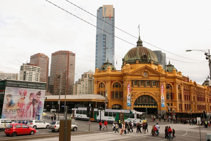 A tram passes Flinders Street Station in Melbourne, Australia. Melbourne looks ripe for a correction these days. Scott Barbour / Getty Images