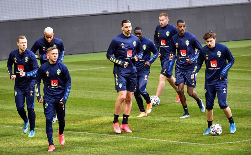 Sweden's Zlatan Ibrahimovic with teammates. Reuters