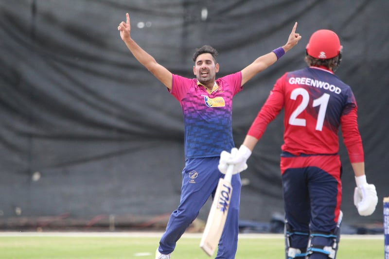 Zahoor Khan celebrates a wicket.
