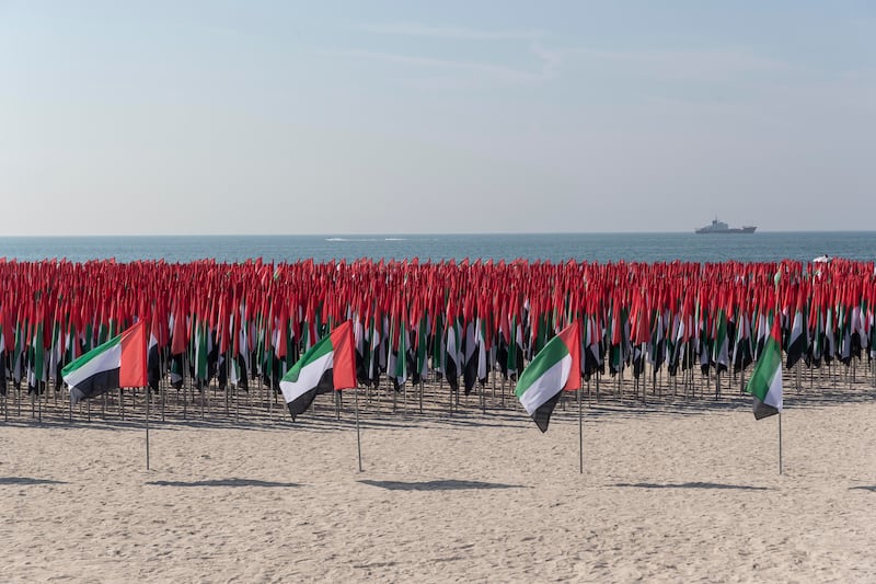 A display of UAE flags on Kite Beach in Dubai.
Antonie Robertson / The National