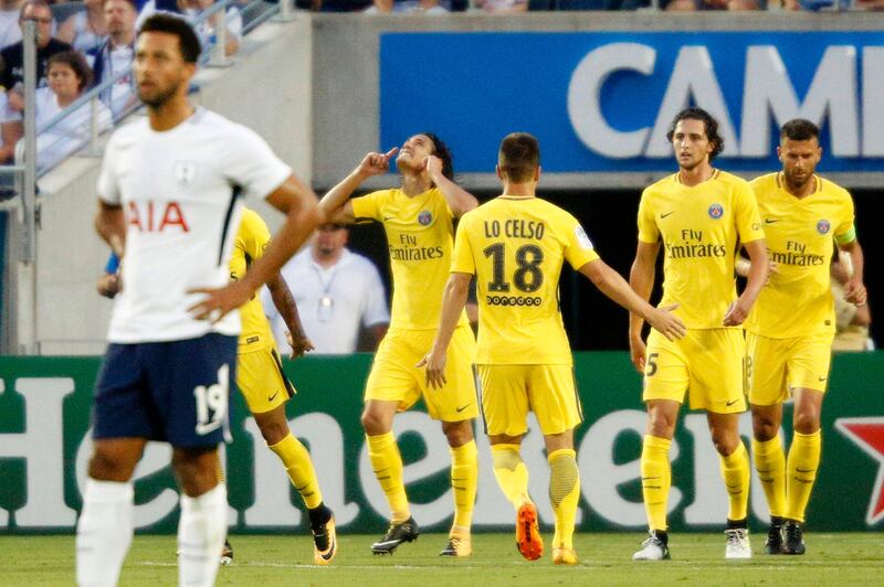 Edinson Cavani of Paris Saint-Germain, second from left, celebrates after scoring a goal against Tottenham Hotspur during their friendly in Orlando. Gregg Newton / AFP