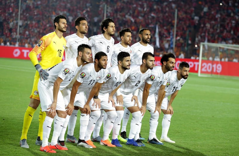 The Egyptian players pose before the match. EPA