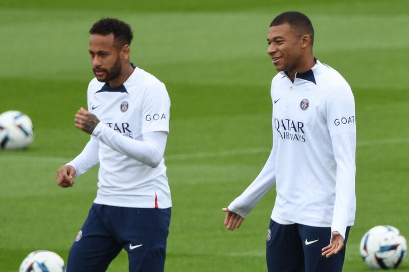Kylian Mbappe and Neymar during training. AFP