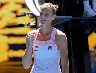 Karolina Pliskova of the Czech Republic reacts after winning her quarterfinal against United States' Serena Williams at the Australian Open tennis championships in Melbourne, Australia, Wednesday, Jan. 23, 2019. (AP Photo/Andy Brownbill)