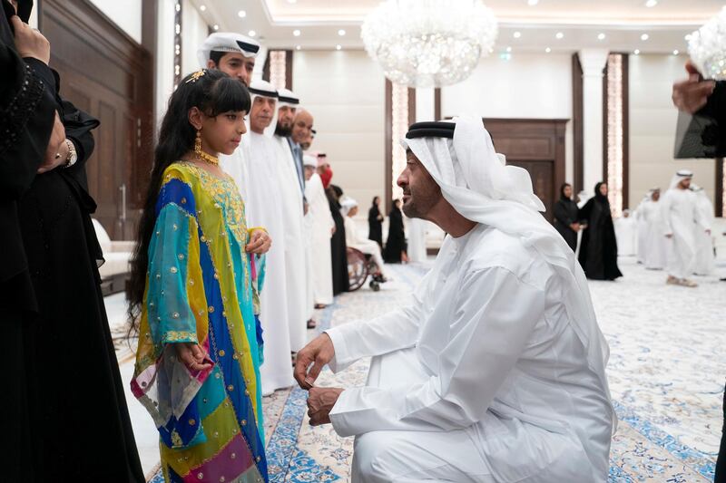 ABU DHABI, UNITED ARAB EMIRATES - May 21, 2019: HH Sheikh Mohamed bin Zayed Al Nahyan, Crown Prince of Abu Dhabi and Deputy Supreme Commander of the UAE Armed Forces (R), receives members of Adheedak group during an iftar reception at Al Bateen Palace.

( Eissa Al Hammadi for the Ministry of Presidential Affairs )
---