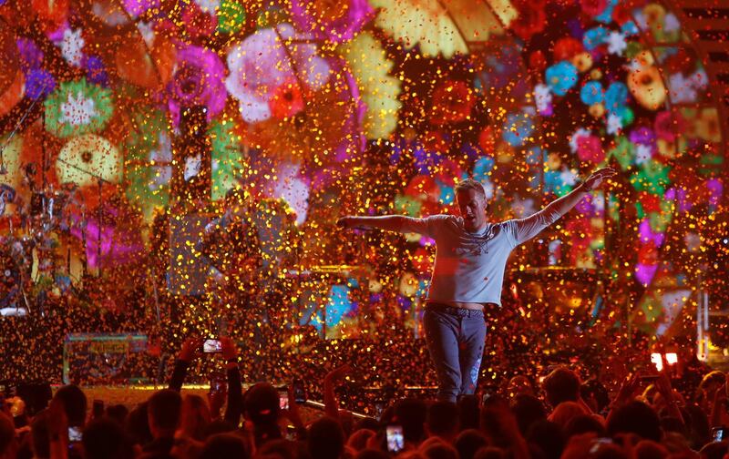FILE PHOTO: Coldplay lead singer Chris Martin performs during the iHeartRadio Music Festival at T-Mobile Arena in Las Vegas, Nevada U.S. September 22, 2017. REUTERS/Steve Marcus/File Photo