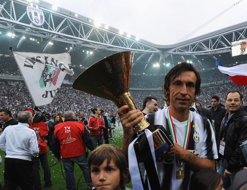Andrea Pirlo with the Serie A trophy in 2012. Getty
