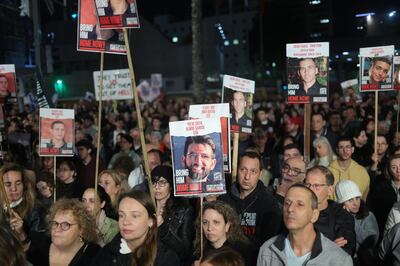 Protesters take part in a rally calling for the immediate release of Israeli hostages held by Hamas in Gaza, outside the Kirya military base in Tel Aviv. EPA