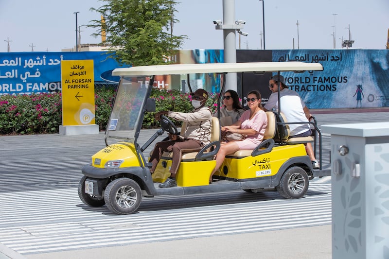 Free buggy taxis take visitors to the pavilions. 