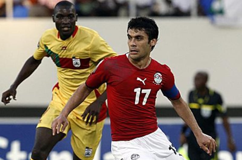 Ahmed Hassan, right, will win his 170th Egypt cap today.