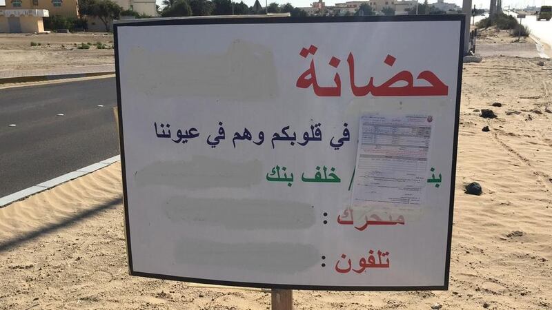 Fifty illegal advertisements were taken down across Abu Dhabi by the municipality. Courtesy Abu Dhabi Municipality