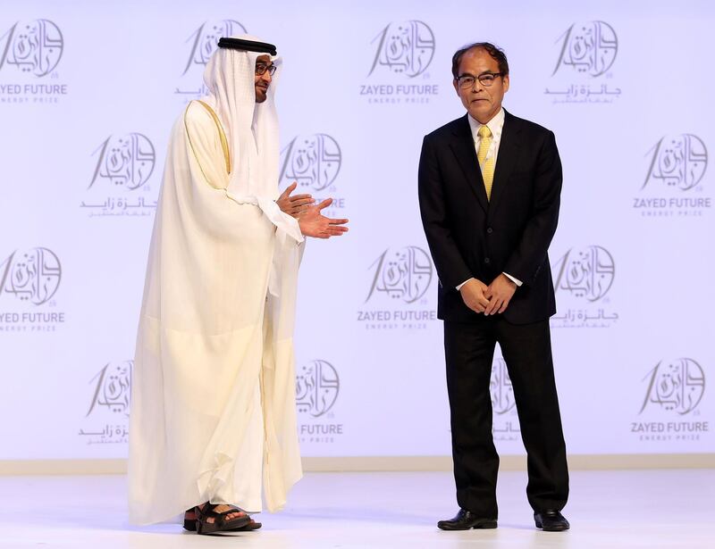 Abu Dhabi, United Arab Emirates - January 15th, 2018: Lifetime achievement award goes to Shoji Nakamura joined by Sheikh Mohammed bin Zayed Al Nahyan at the Sheikh Zayed Future Energy Prize awards ceremony as part of Abu Dhabi Sustainability Week. Monday, January 15th, 2018 at Abu Dhabi National Exhibition Centre (ADNEC), Abu Dhabi. Chris Whiteoak / The National