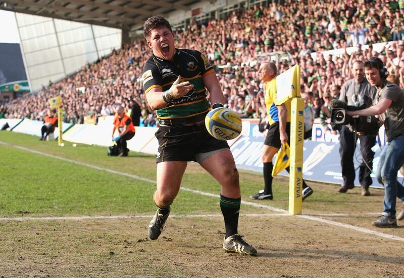 Ethan Waller of Northampton celebrates after scoring a try during the Aviva Premiership match between Northampton Saints and Leicester Tigers at Franklin’s Gardens on March 29, 2014 in Northampton, England. David Rogers/Getty Images