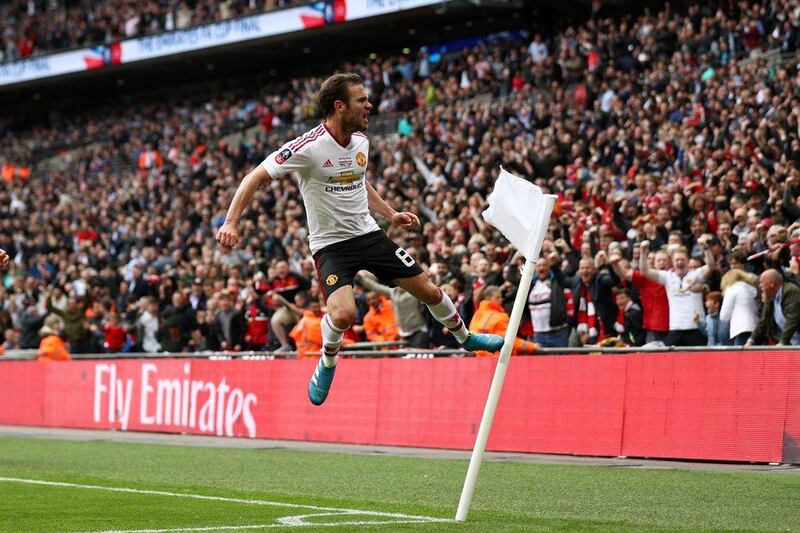 Juan Mata of Manchester United celebrates as he scores their first goal during the FA Cup Final match between Manchester United and Crystal Palace at Wembley Stadium on May 21, 2016 in London, England. (Paul Gilham/Getty Images)