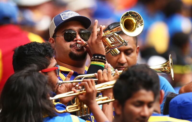 Sri Lankan fans play the trumpets during the 2015 ICC Cricket World Cup match between Australia and Sri Lanka at the Sydney Cricket Ground on March 8, 2015 in Australia. Getty Images